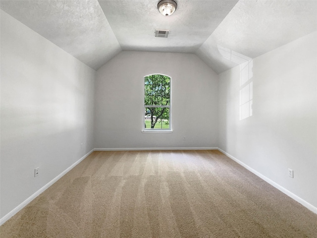 7206 Fiesta Flower, Katy, TX 77494 - bonus room with a textured ceiling, baseboards, visible vents, and carpet floors