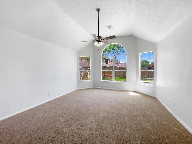 7206 Fiesta Flower, Katy, TX 77494 - carpeted spare room with ceiling fan, visible vents, baseboards, and vaulted ceiling