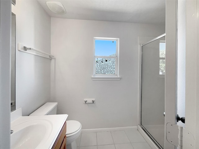 7206 Fiesta Flower, Katy, TX 77494 - bathroom with a shower stall, tile patterned floors, vanity, and toilet
