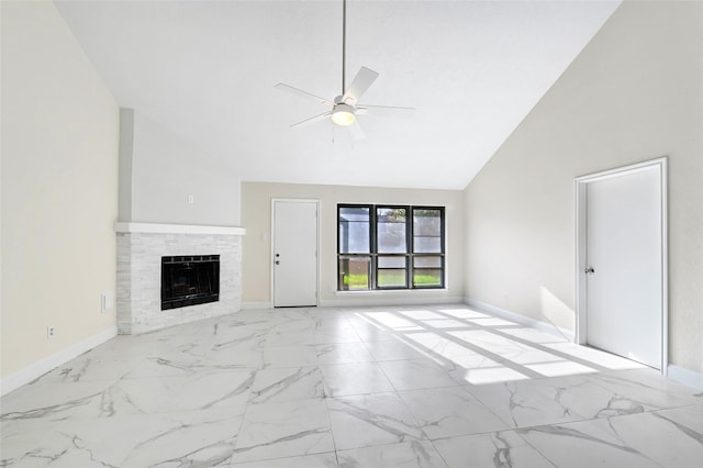 13723 Rocky Bluff Dr, Houston, TX 77085 - unfurnished living room with a ceiling fan, marble look tiles, a fireplace, and high vaulted ceiling