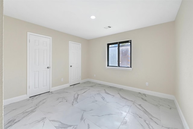 13723 Rocky Bluff Dr, Houston, TX 77085 - unfurnished bedroom with recessed lighting and light marble finish flooring