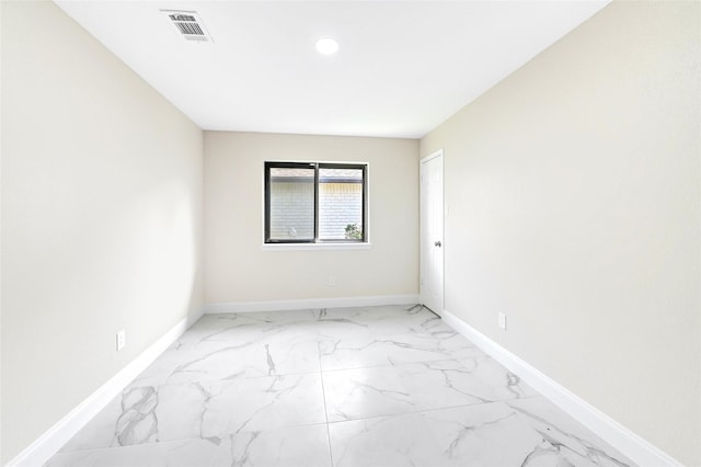 13723 Rocky Bluff Dr, Houston, TX 77085 - unfurnished room with light marble finish floors and recessed lighting