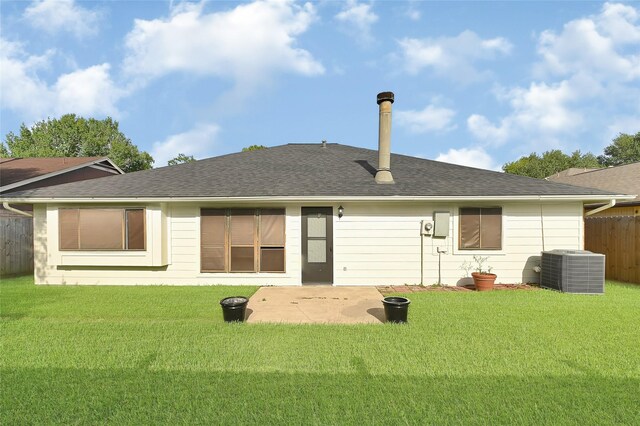 13723 Rocky Bluff Dr, Houston, TX 77085 - rear view of house featuring a patio area and roof with shingles