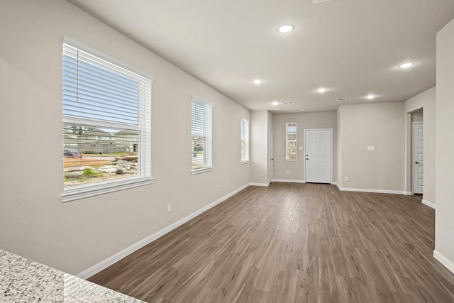 302 Elk Run Ln, Huntsville, TX 77320 - interior space with baseboards, recessed lighting, and wood finished floors