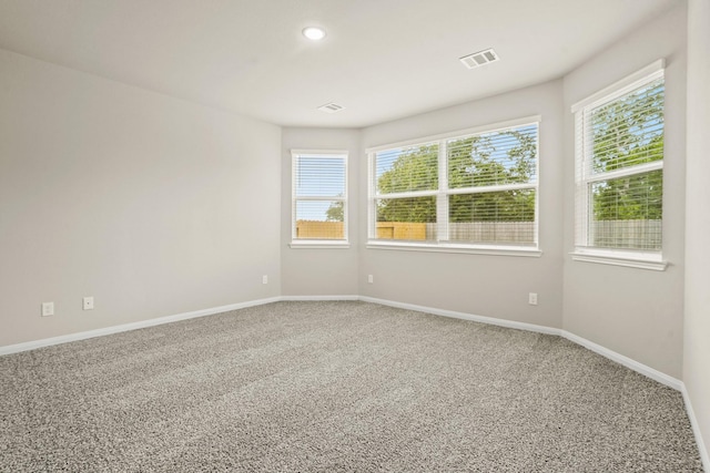 302 Elk Run Ln, Huntsville, TX 77320 - empty room with carpet flooring, visible vents, and baseboards