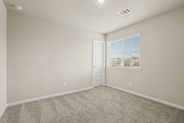 302 Elk Run Ln, Huntsville, TX 77320 - carpeted spare room with baseboards and visible vents