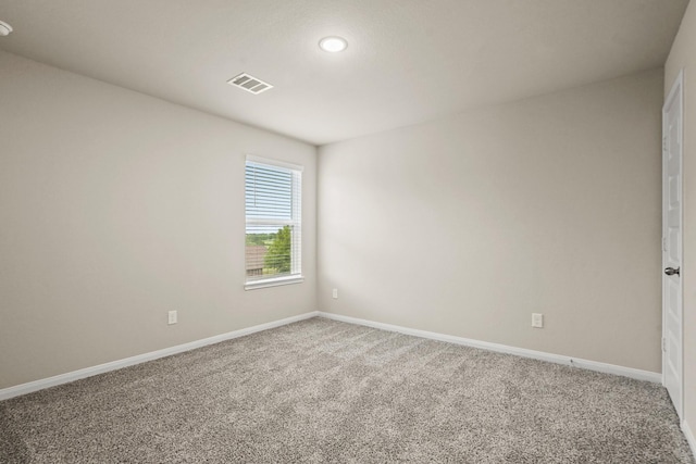 302 Elk Run Ln, Huntsville, TX 77320 - spare room with recessed lighting, visible vents, carpet floors, and baseboards