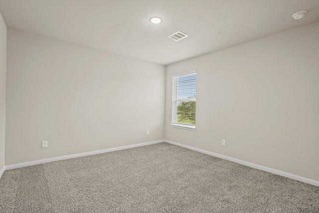 302 Elk Run Ln, Huntsville, TX 77320 - empty room featuring baseboards, visible vents, and carpet floors