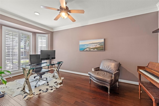 office space featuring baseboards, hardwood / wood-style flooring, ornamental molding, and a ceiling fan