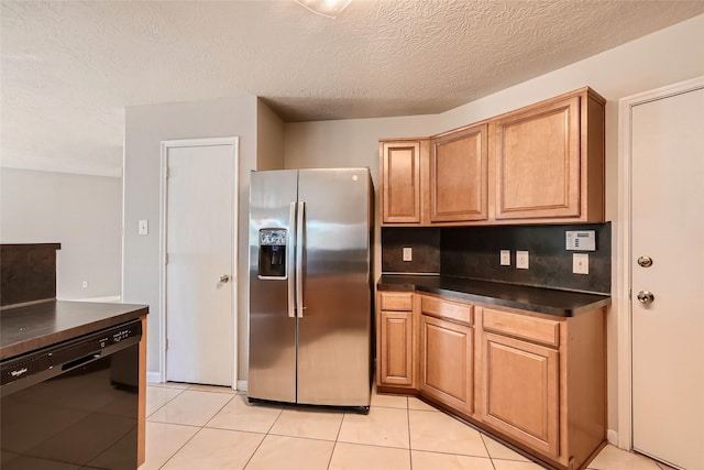 514 Remington Green Ct, Houston, TX 77073 - kitchen with stainless steel fridge with ice dispenser, dark countertops, light tile patterned flooring, and dishwasher