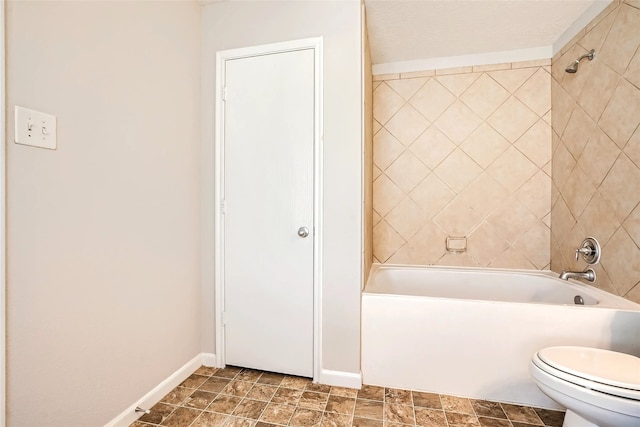 514 Remington Green Ct, Houston, TX 77073 - full bathroom with toilet, shower / tub combination, and baseboards