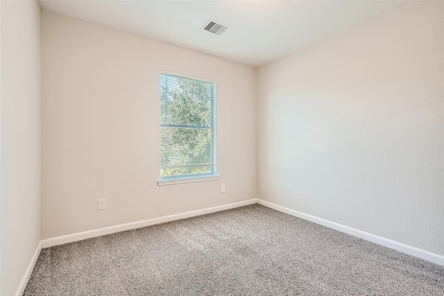 514 Remington Green Ct, Houston, TX 77073 - unfurnished room featuring baseboards, visible vents, and carpet floors