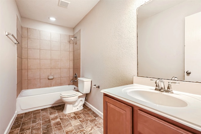 514 Remington Green Ct, Houston, TX 77073 - full bath with shower / bathing tub combination, vanity, visible vents, toilet, and baseboards