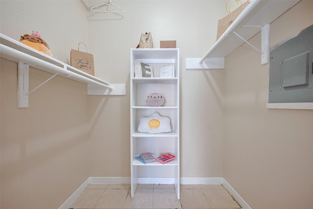 spacious closet with tile patterned floors and electric panel