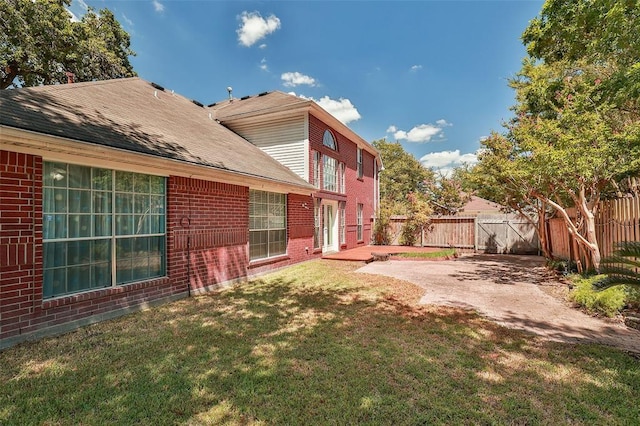 view of yard featuring a patio area and fence