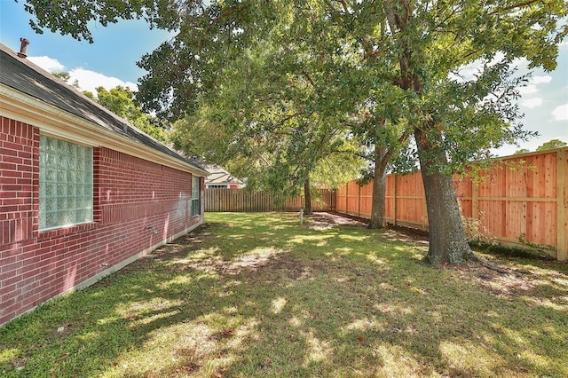view of yard featuring a fenced backyard