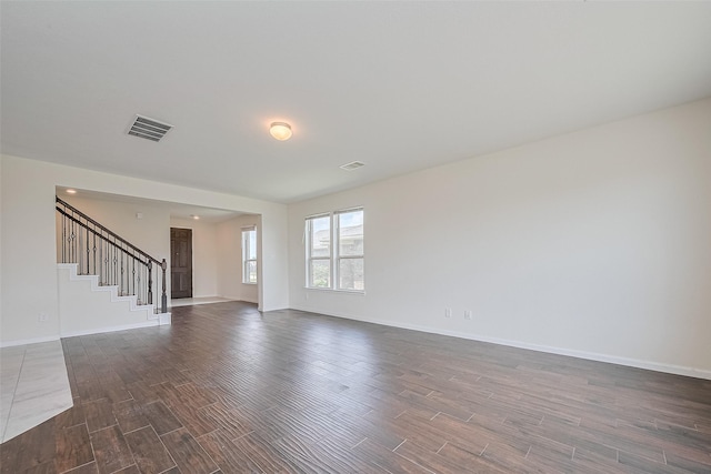 25327 Cheshire Knoll St, Katy, TX 77493 - unfurnished living room with dark wood finished floors, stairway, and baseboards
