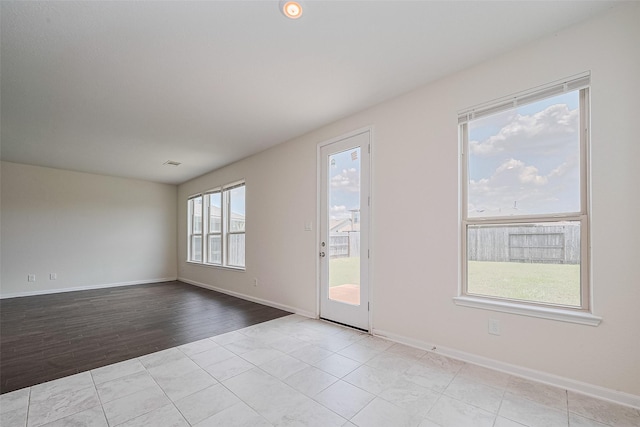 25327 Cheshire Knoll St, Katy, TX 77493 - unfurnished room with baseboards and wood finished floors