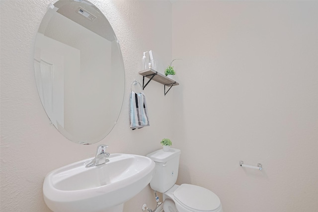 25327 Cheshire Knoll St, Katy, TX 77493 - half bathroom featuring a sink and toilet