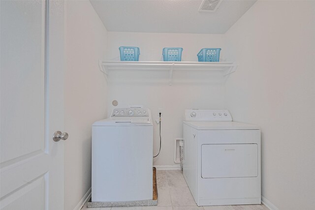 25327 Cheshire Knoll St, Katy, TX 77493 - laundry area featuring independent washer and dryer and baseboards