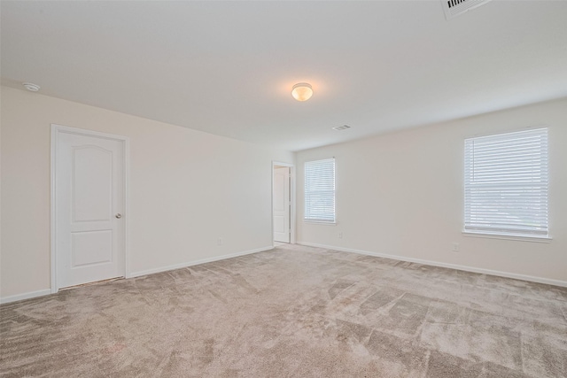 25327 Cheshire Knoll St, Katy, TX 77493 - carpeted empty room featuring baseboards and a smoke detector