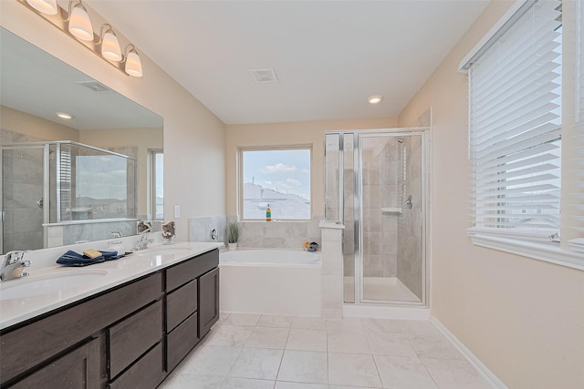 25327 Cheshire Knoll St, Katy, TX 77493 - full bath featuring a garden tub, double vanity, a stall shower, recessed lighting, and tile patterned flooring
