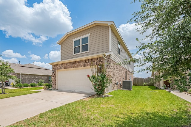 25327 Cheshire Knoll St, Katy, TX 77493 - view of front of property featuring cooling unit, brick siding, a garage, and concrete driveway