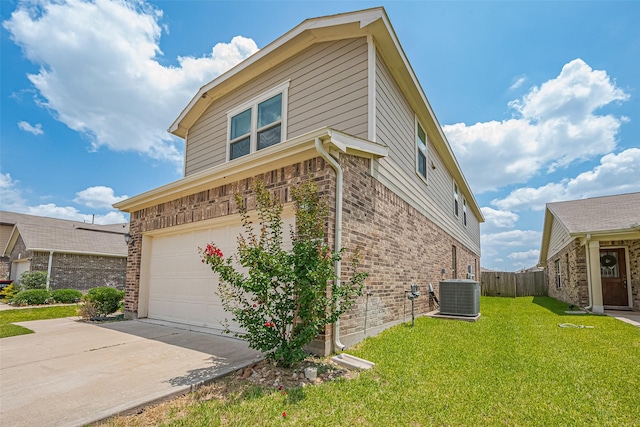 25327 Cheshire Knoll St, Katy, TX 77493 - view of property exterior featuring brick siding, an attached garage, central air condition unit, and concrete driveway