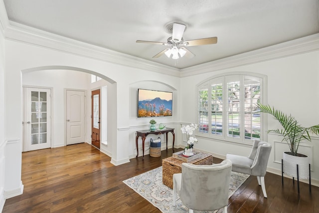15614 Stone Gables Ln, Houston, TX 77044 - living area featuring a ceiling fan, hardwood / wood-style flooring, arched walkways, and crown molding