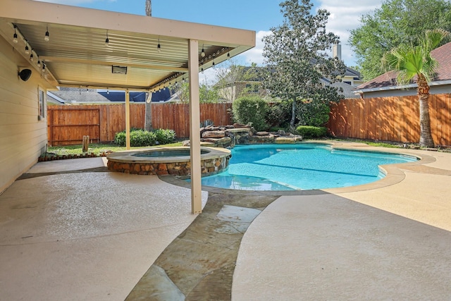 15614 Stone Gables Ln, Houston, TX 77044 - view of pool with a fenced backyard, a patio area, and a pool with connected hot tub