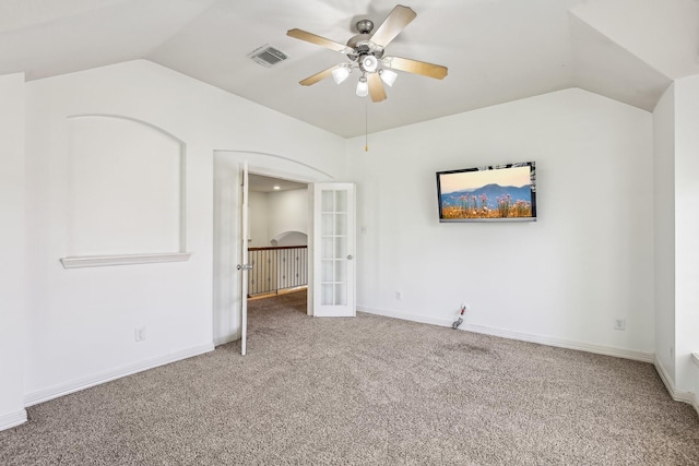 15614 Stone Gables Ln, Houston, TX 77044 - unfurnished bedroom featuring vaulted ceiling, french doors, carpet flooring, baseboards, and a ceiling fan