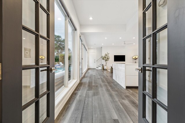 2114 Wroxton Rd, Houston, TX 77005 - hall with french doors, wood finished floors, and recessed lighting