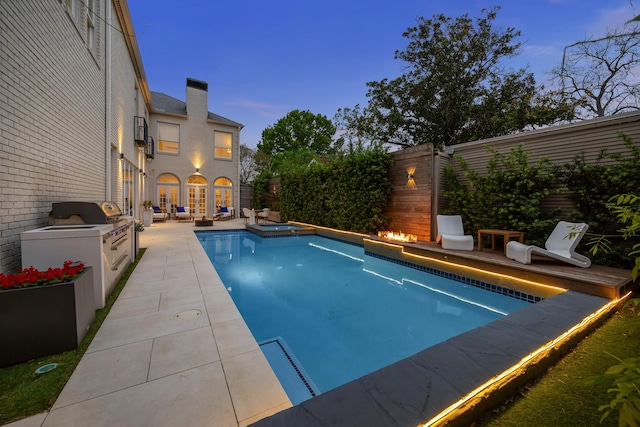 2114 Wroxton Rd, Houston, TX 77005 - view of pool featuring area for grilling, a fenced backyard, and a fenced in pool