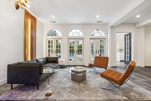 2114 Wroxton Rd, Houston, TX 77005 - living room with french doors, baseboards, visible vents, and wood finished floors