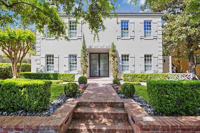 2114 Wroxton Rd, Houston, TX 77005 - view of front of home featuring brick siding