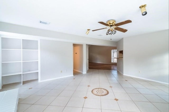 16007 Sierra Vista Dr, Houston, TX 77083 - unfurnished room featuring light tile patterned floors, visible vents, baseboards, and ceiling fan