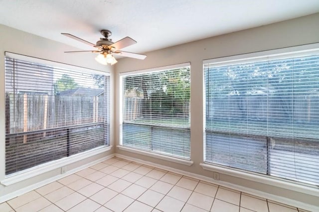 16007 Sierra Vista Dr, Houston, TX 77083 - interior space featuring ceiling fan, light tile patterned flooring, and baseboards