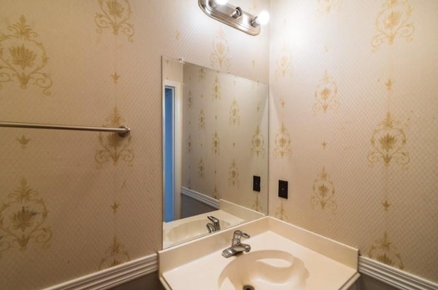 16007 Sierra Vista Dr, Houston, TX 77083 - bathroom with vanity and wallpapered walls