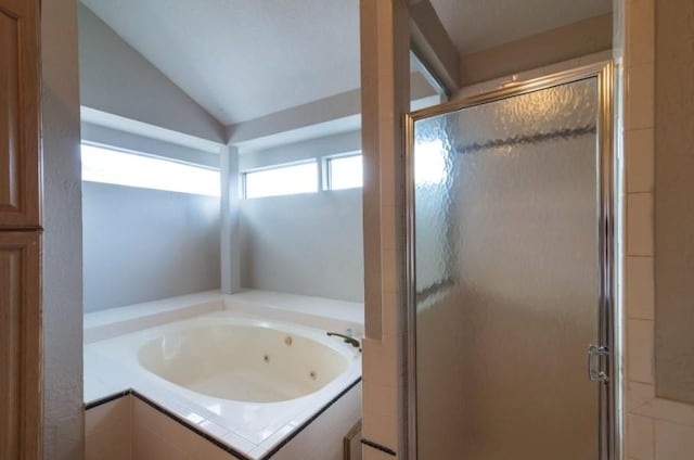 16007 Sierra Vista Dr, Houston, TX 77083 - bathroom with a shower stall, lofted ceiling, and a tub with jets