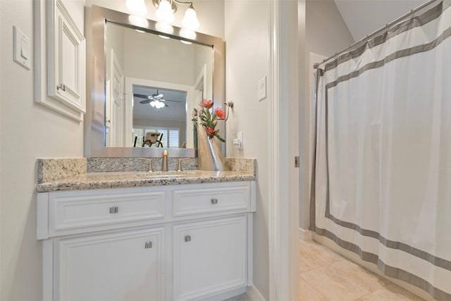 15431 Greens Cove Way, Houston, TX 77059 - full bath featuring vanity, a ceiling fan, a shower with shower curtain, and tile patterned floors