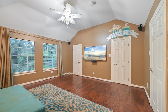 15431 Greens Cove Way, Houston, TX 77059 - unfurnished bedroom with lofted ceiling, wood finished floors, baseboards, and ceiling fan