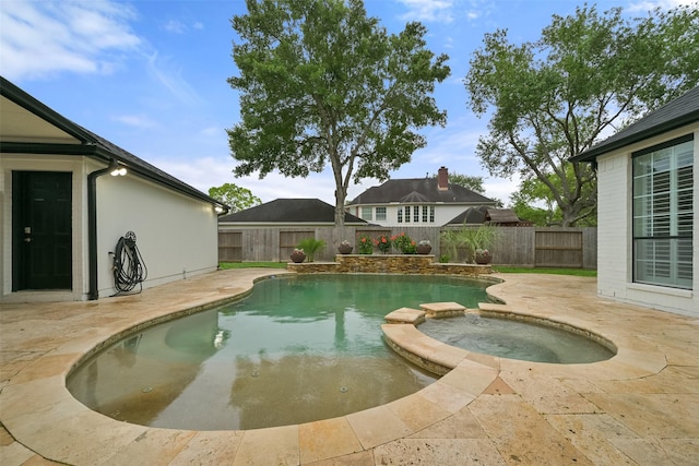 15431 Greens Cove Way, Houston, TX 77059 - view of pool with a patio area, a fenced backyard, and a pool with connected hot tub