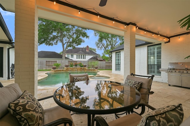 15431 Greens Cove Way, Houston, TX 77059 - view of patio with a fenced backyard, outdoor dining area, and a grill