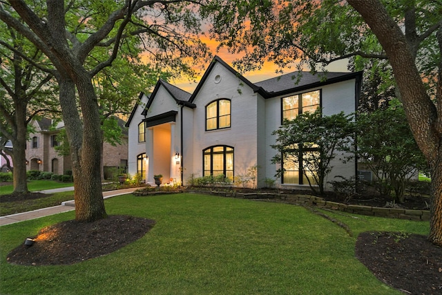 15431 Greens Cove Way, Houston, TX 77059 - french country inspired facade with brick siding and a front lawn