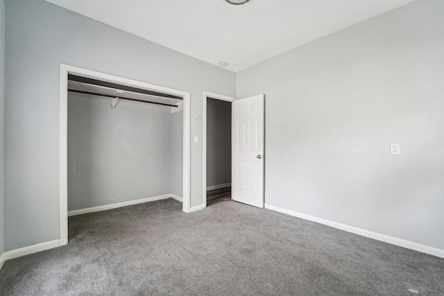 5910 Edward Dr, Houston, TX 77396 - unfurnished bedroom with a closet, carpet flooring, and baseboards