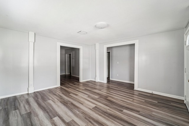 5910 Edward Dr, Houston, TX 77396 - spare room with dark wood-type flooring and baseboards