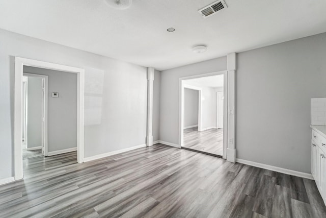 5910 Edward Dr, Houston, TX 77396 - unfurnished room featuring visible vents, baseboards, and wood finished floors