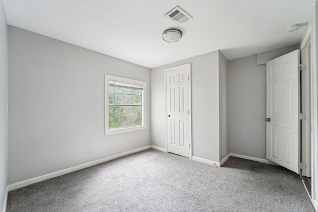5910 Edward Dr, Houston, TX 77396 - unfurnished bedroom featuring visible vents, baseboards, and carpet