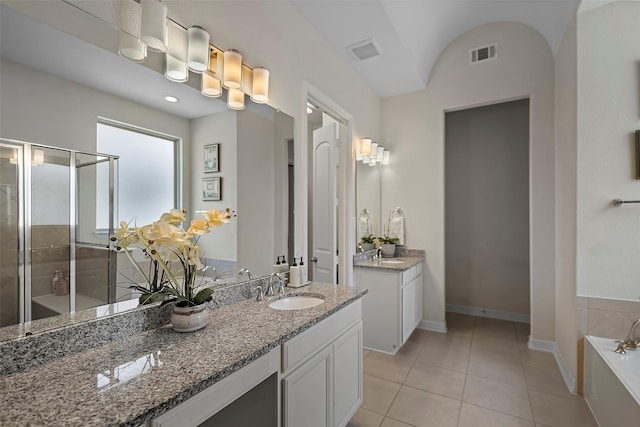 full bathroom featuring a sink, visible vents, tile patterned floors, and a stall shower