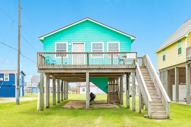 back of property featuring a carport, a yard, driveway, and stairs